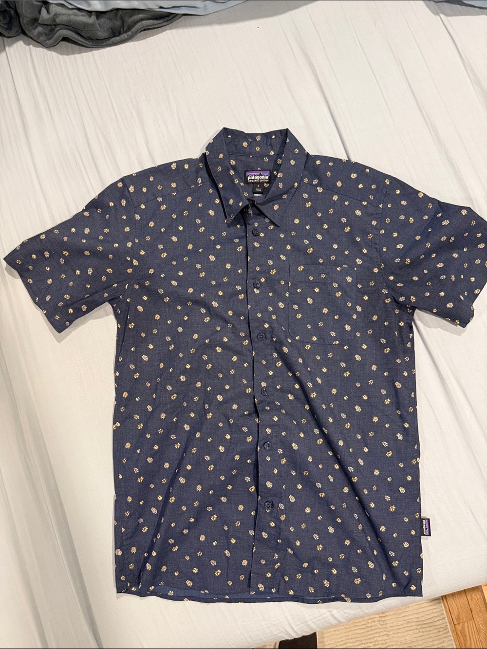 Patagonia Navy Short-Sleeve Button-Up with Small Yellow Floral Print